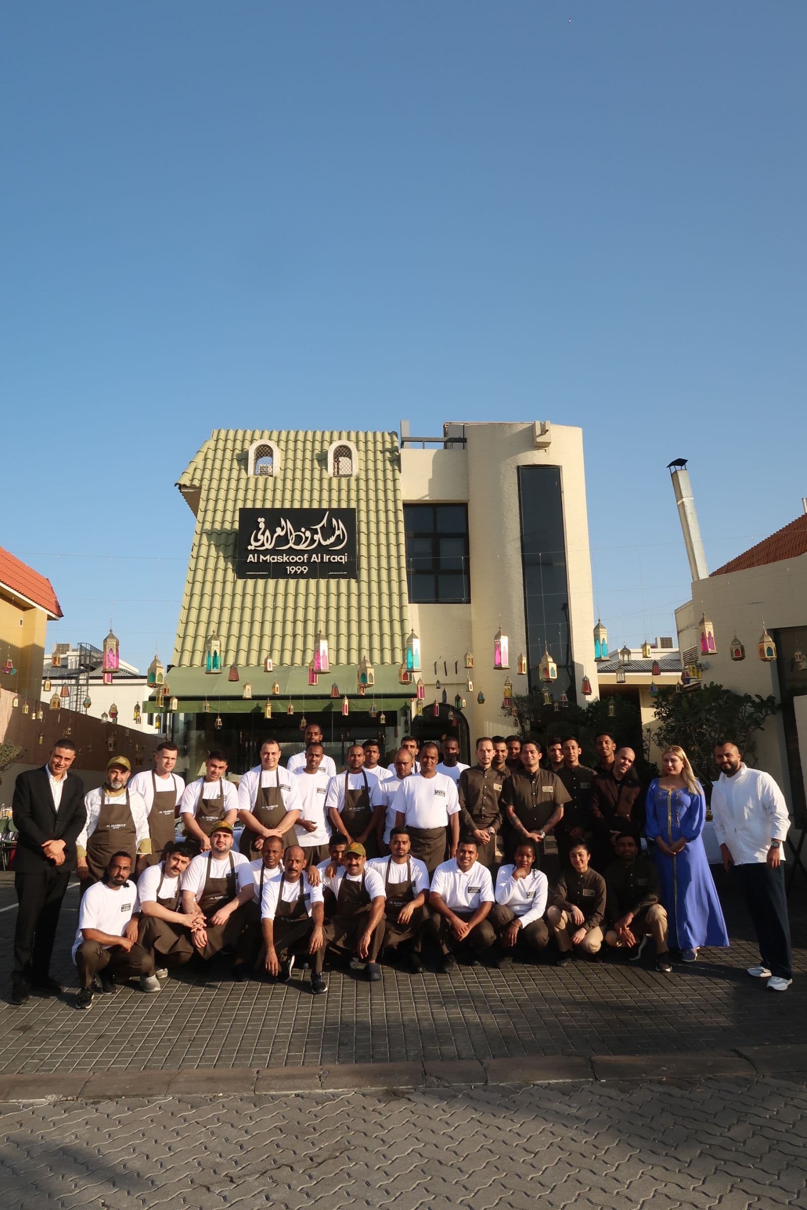 The Maskoof team in front of the restaurant on Al Wasl Road, Dubai