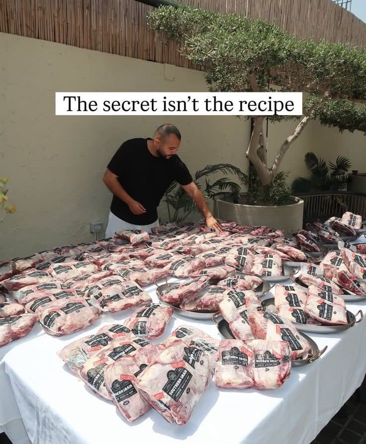 Khattab Omar inspecting the day's meat order